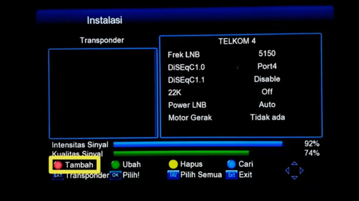 tekan tombol Merah diremot.